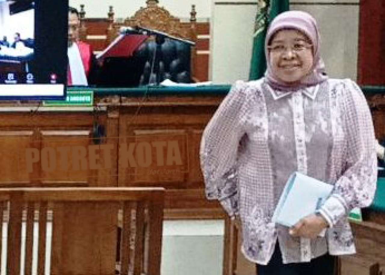 Erna Purnawati.